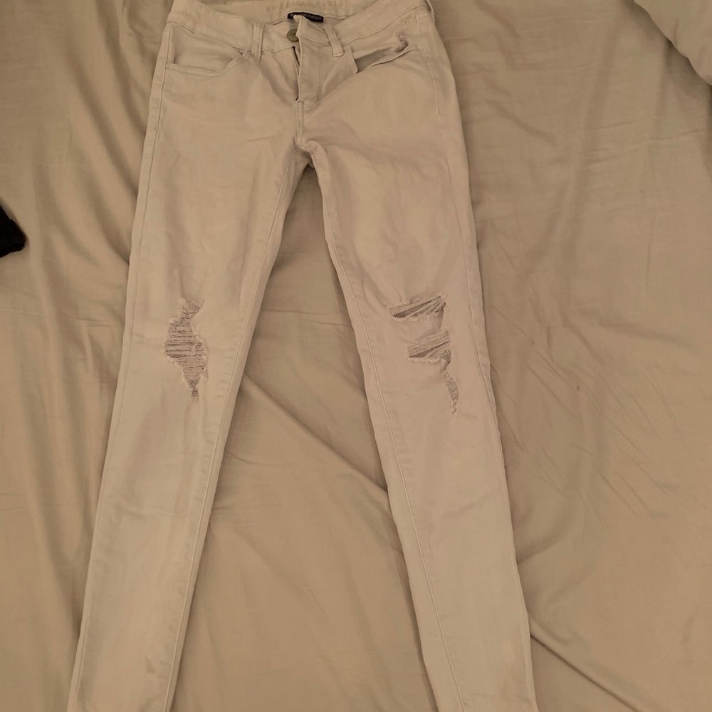 Light wash denim American Eagle jeans.